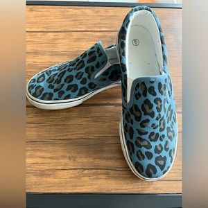 Blue cheetah print slip on sneakers
